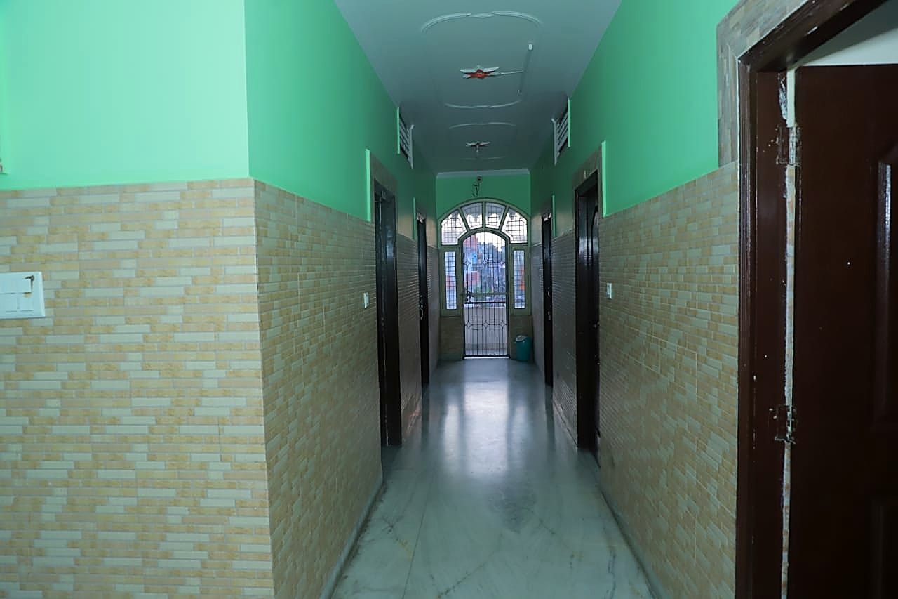 Hotel Chandreshwar hallway leading to guest rooms